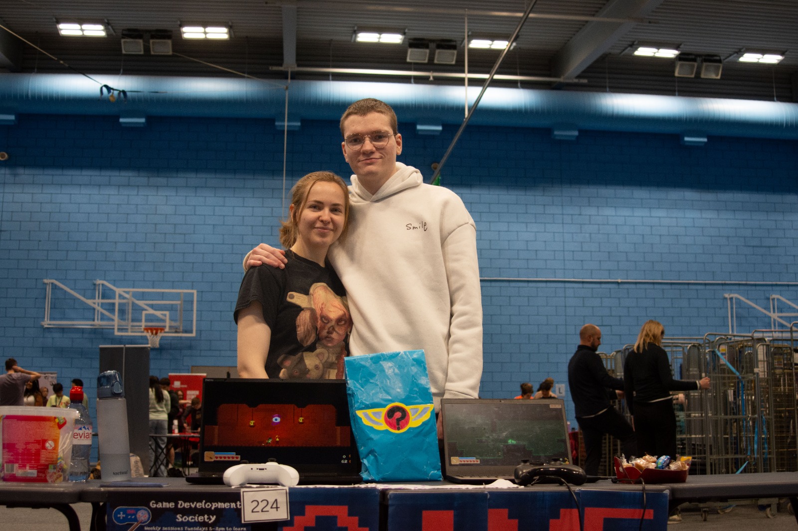 Me at the Game Development Society stall, showing off a build on two laptops